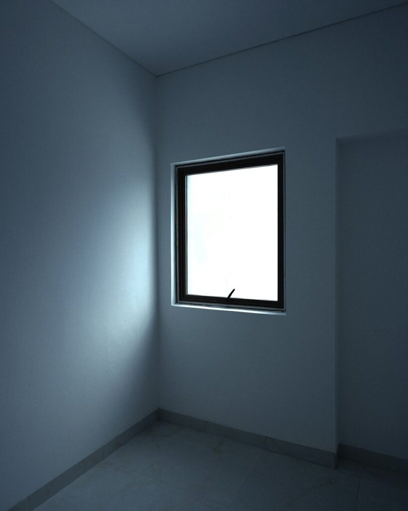 A bare, empty room corner before styling